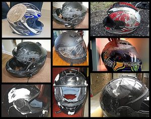 Cascos de moto con rozaduras y roturas